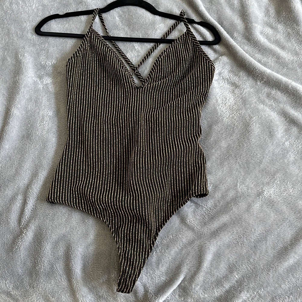 Black and gold bodysuit
